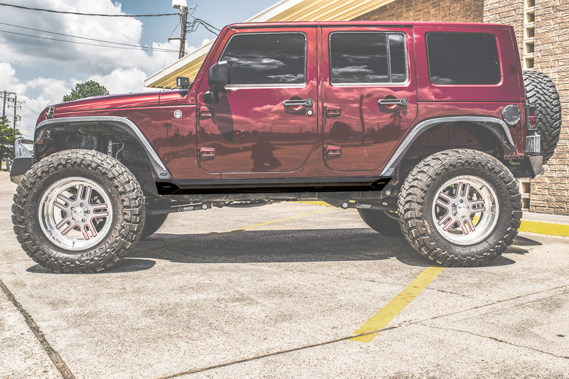 Load image into Gallery viewer, Jeep Wrangler JKU "Ambush Series" Side Steps / Rock Sliders w/ Integrated LED Rock Lights
