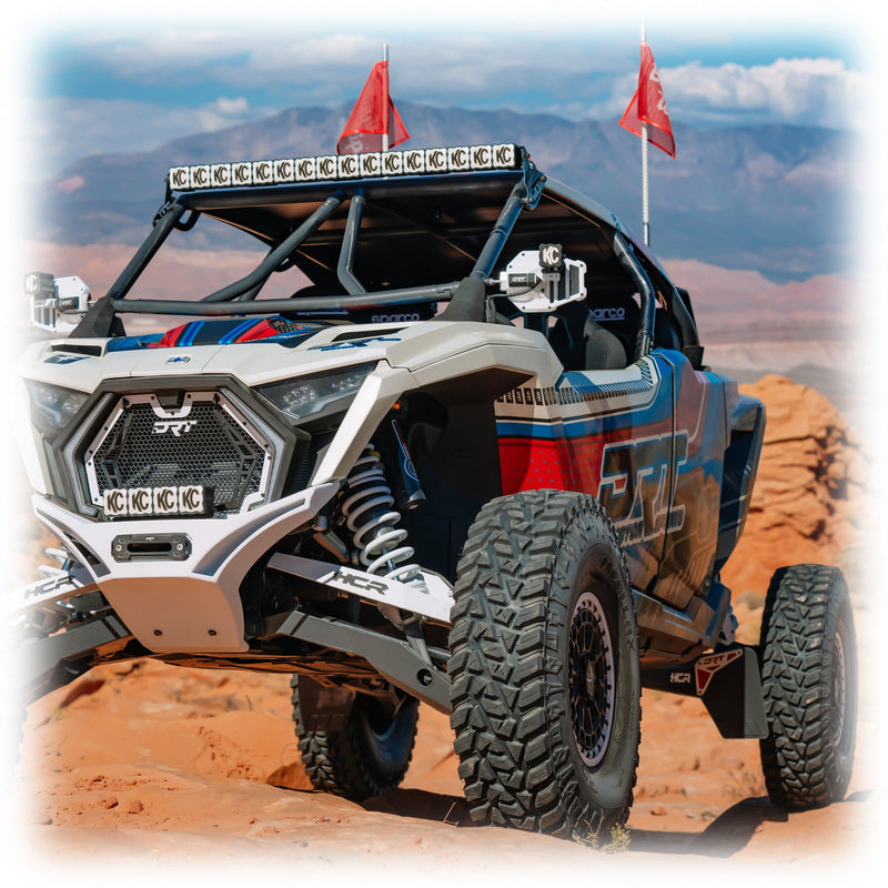 Load image into Gallery viewer, DRT Polaris RZR Pro R /Pro S/Turbo R 2022+ on sand with the V2.0 Front Winch Bumper on white