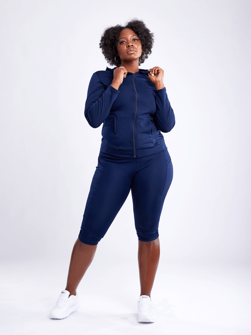 Load image into Gallery viewer, JupiterGear Mid-Rise Capri Fitness Leggings with Side Pockets