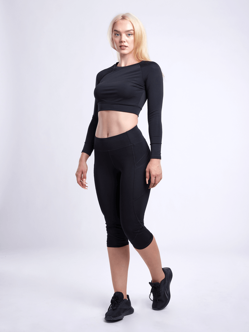 Load image into Gallery viewer, JupiterGear Mid-Rise Capri Fitness Leggings with Side Pockets