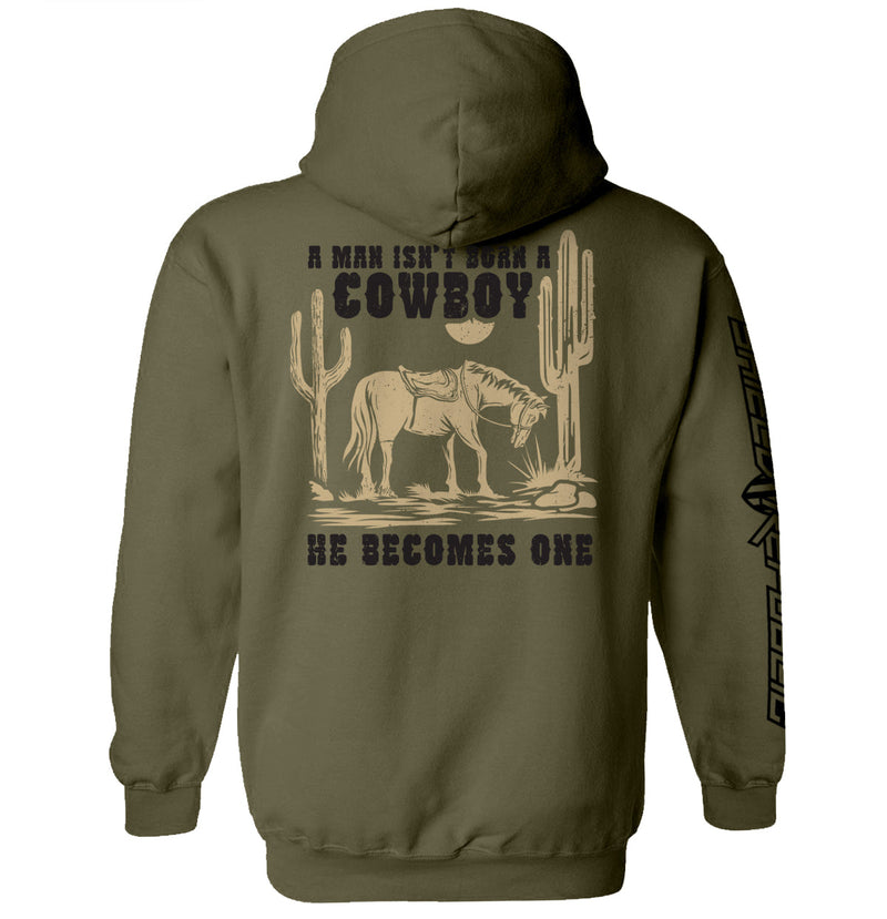 Load image into Gallery viewer, A Man Isn't Born A Cowboy