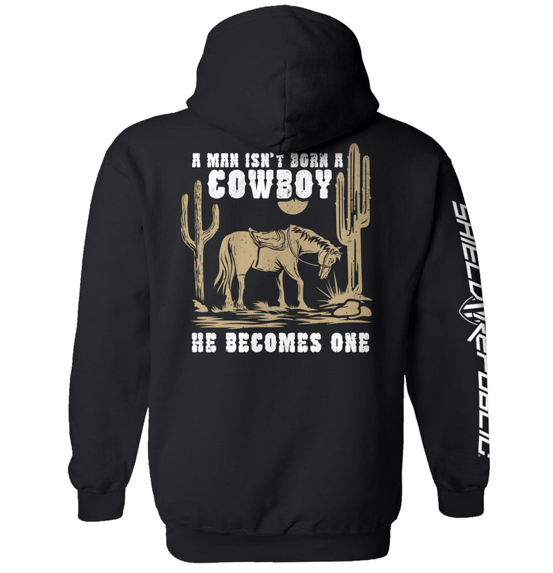 Load image into Gallery viewer, A Man Isn't Born A Cowboy