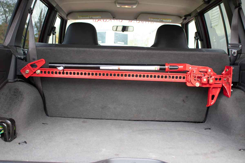 Load image into Gallery viewer, Fishbone Offroad Rear Seat Hi-Lift Jack Mount for 1984-2001 Jeep Cherokee FB25314