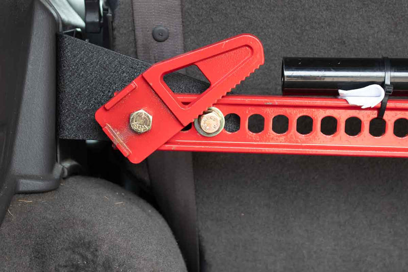Load image into Gallery viewer, Fishbone Offroad Rear Seat Hi-Lift Jack Mount for 1984-2001 Jeep Cherokee FB25314