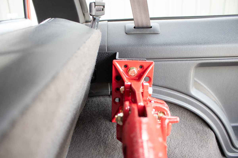 Load image into Gallery viewer, Fishbone Offroad Rear Seat Hi-Lift Jack Mount for 1984-2001 Jeep Cherokee FB25314