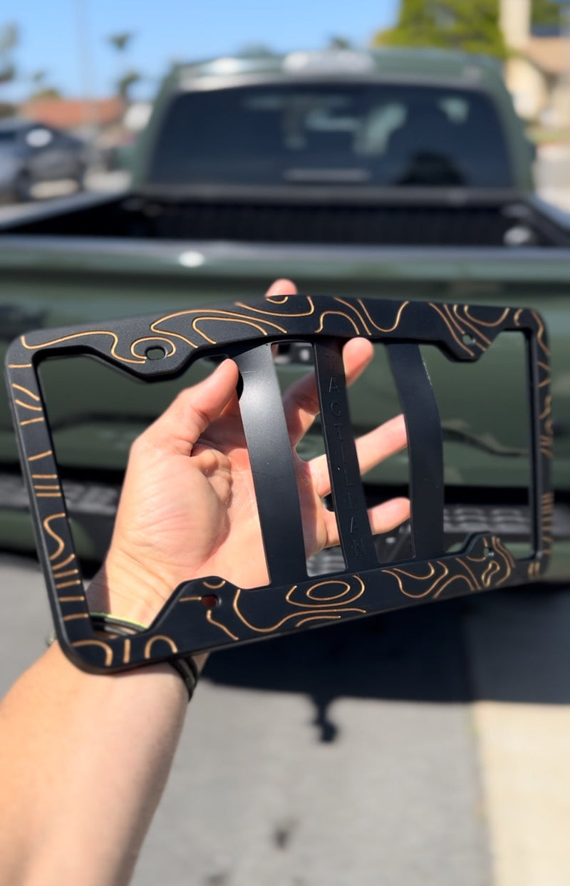 Load image into Gallery viewer, Two-Tone Silicone Topographic License Plate Frame - Anti-Rattle, Anti-Scratch Plate Wrap