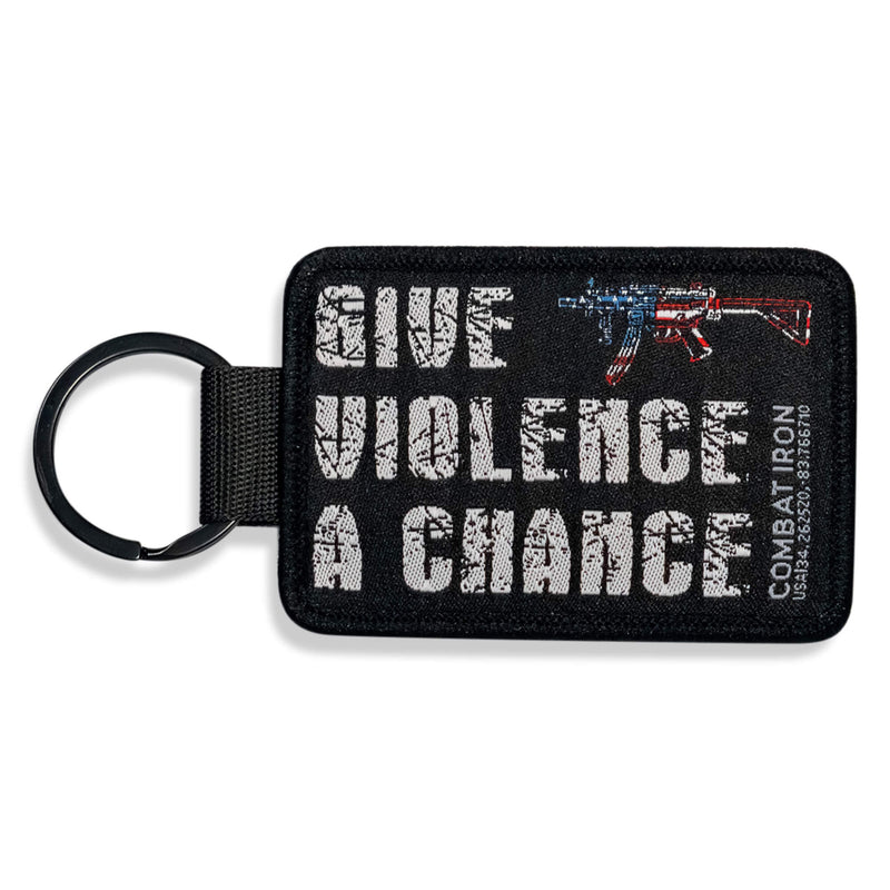 Load image into Gallery viewer, Give Violence A Chance Flight Tag Keychain
