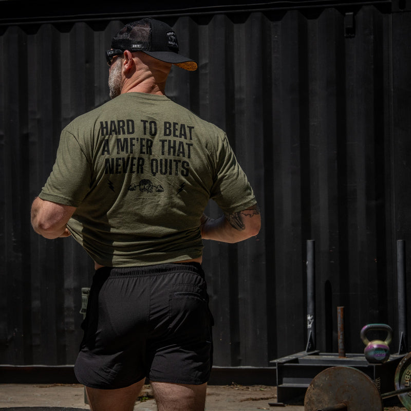 Load image into Gallery viewer, Hard To Beat A Mf'er That Never Quits Men's T-Shirt