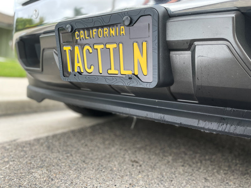 Load image into Gallery viewer, SILICONE TOPOGRAPHY LICENSE PLATE FRAME - ANTI-RATTLE, ANTI-SCRATCH