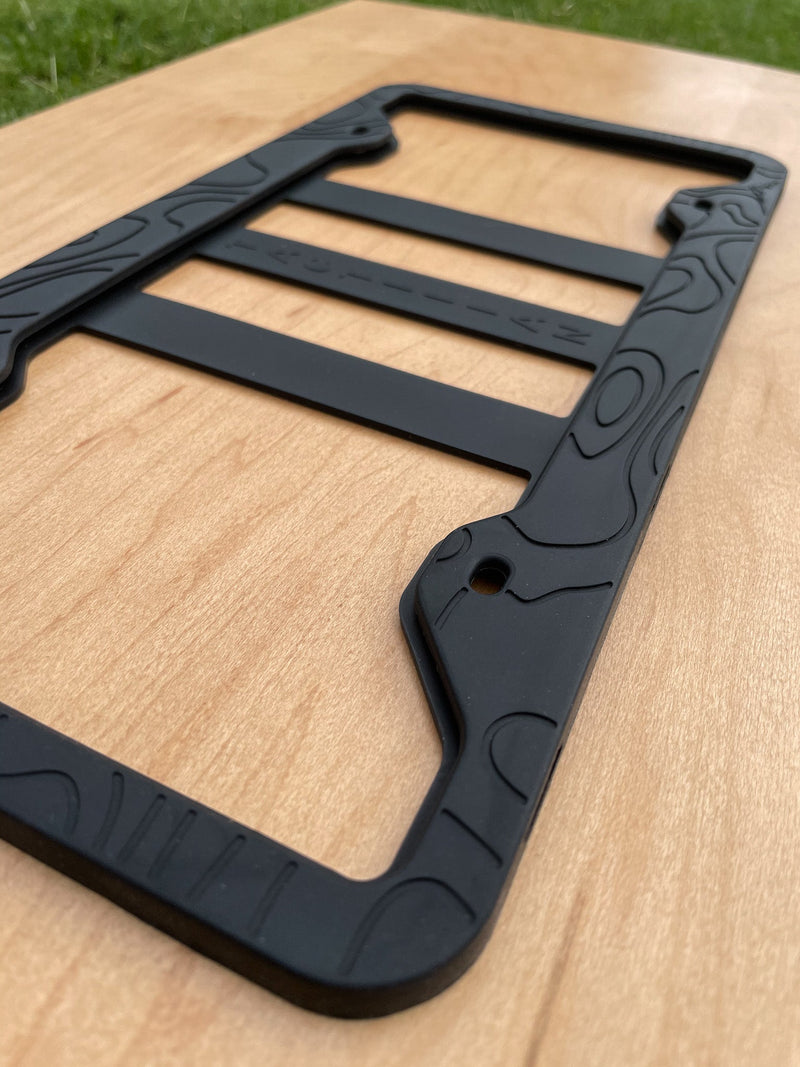 Load image into Gallery viewer, SILICONE TOPOGRAPHY LICENSE PLATE FRAME - ANTI-RATTLE, ANTI-SCRATCH