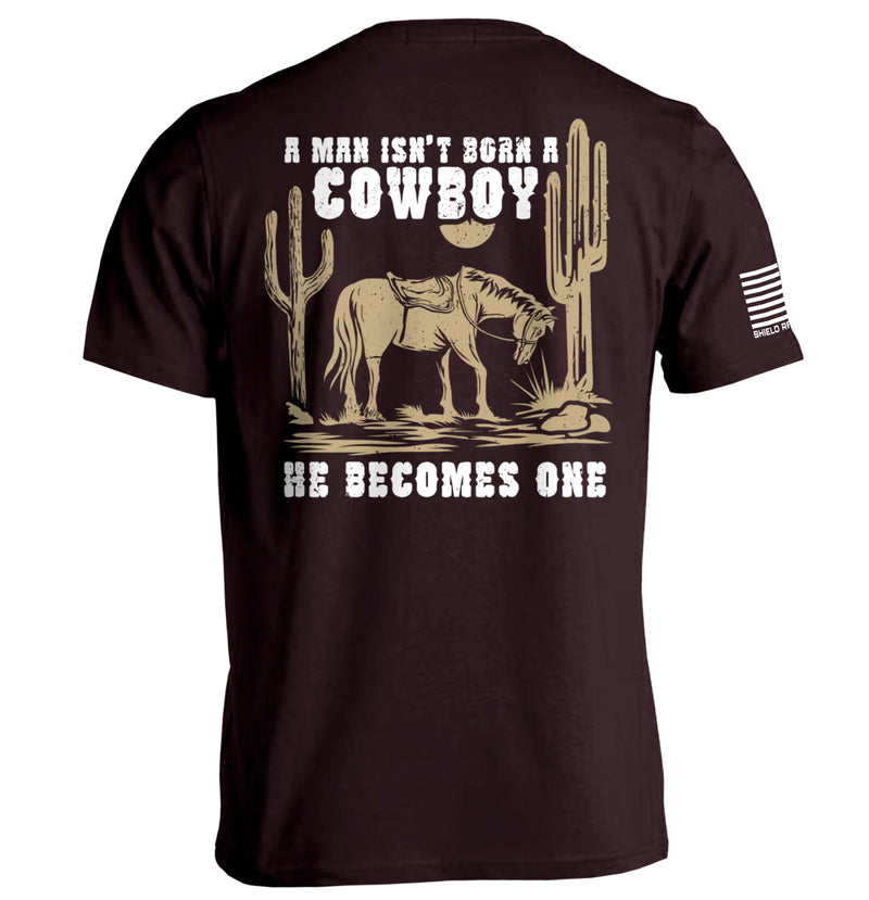 Load image into Gallery viewer, A Man Isn't Born A Cowboy