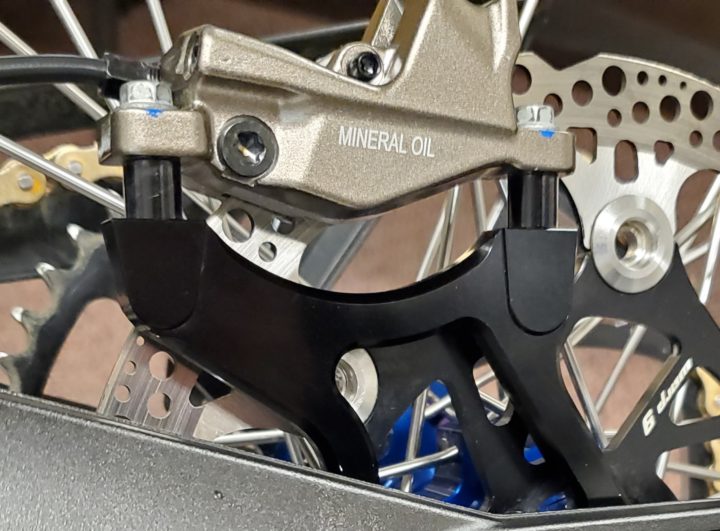 Load image into Gallery viewer, Surron/Talaria 220mm Caliper Adapter Spacer Kit by Warp 9 - PREORDER