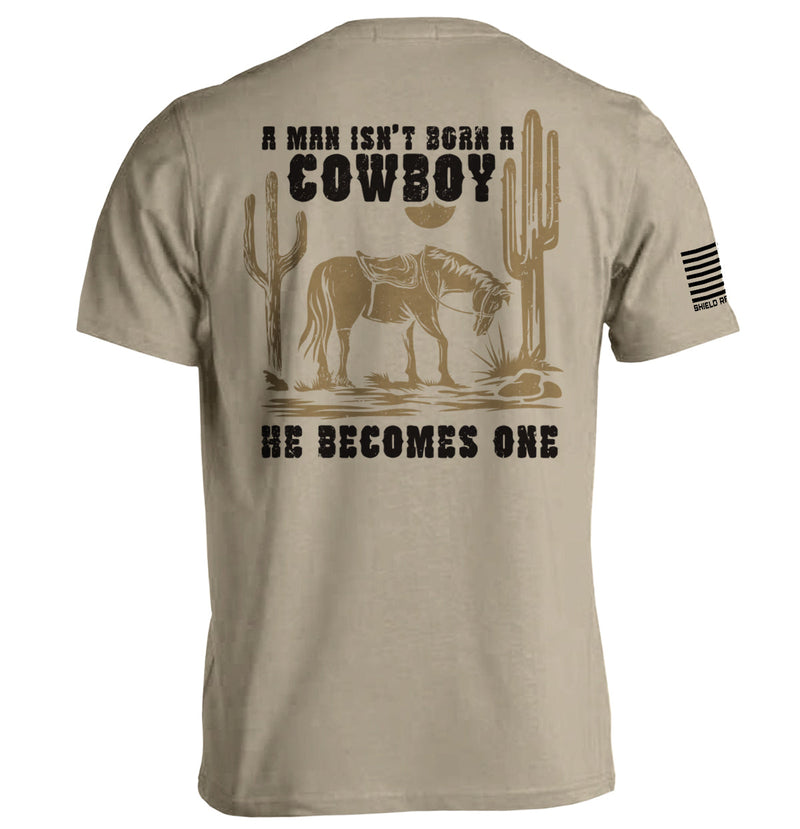 Load image into Gallery viewer, A Man Isn't Born A Cowboy