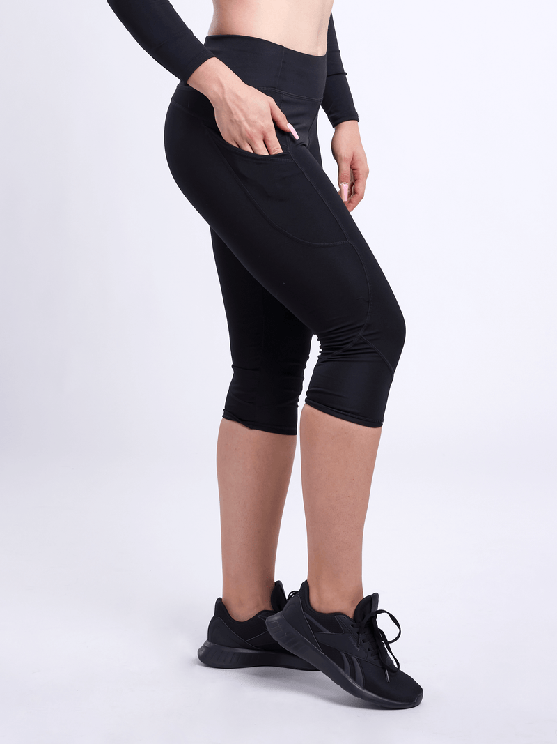 Load image into Gallery viewer, JupiterGear Mid-Rise Capri Fitness Leggings with Side Pockets