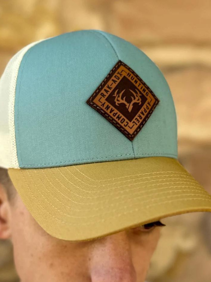 Load image into Gallery viewer, Delta Sky Blue Leather Patch Trucker Hat