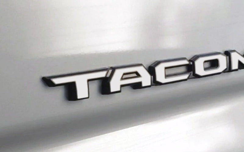 Load image into Gallery viewer, Premium Cast Vinyl Decal Letters for 2024-2026 Tacoma Door Emblems