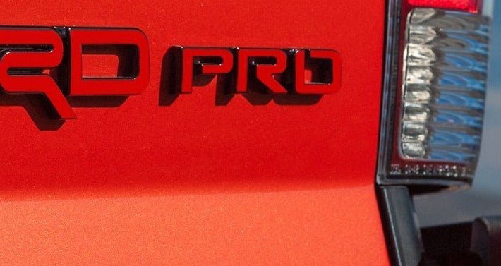 Load image into Gallery viewer, Premium Cast Vinyl Decal Letter Inlays for 4Runner and Tacoma TRD Pro Emblem