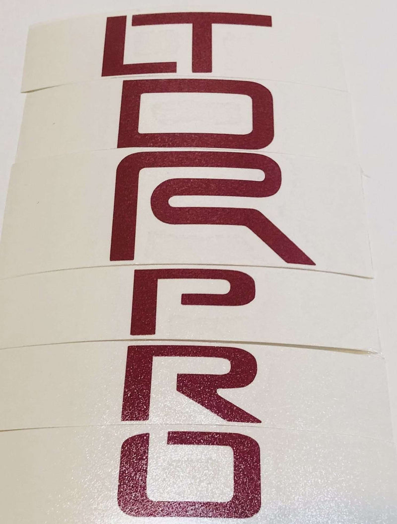 Load image into Gallery viewer, Premium Cast Vinyl Decal Letter Inlays for 4Runner and Tacoma TRD Pro Emblem