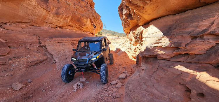 atv with rugged accessories on rocky trail at sunset, golden light, modern style