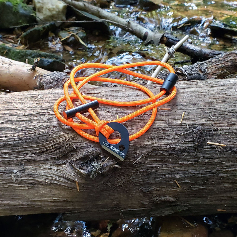 Load image into Gallery viewer, Emergency Fire Starter Necklace - Lightweight Mini Ferro Rod with Steel Claw Striker &amp; Neck Lanyard
