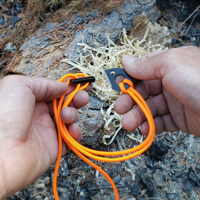 Load image into Gallery viewer, Emergency Fire Starter Necklace - Lightweight Mini Ferro Rod with Steel Claw Striker &amp; Neck Lanyard
