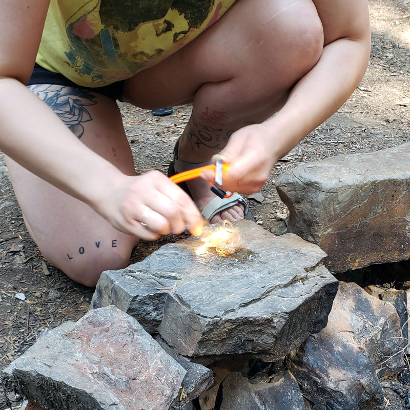 Load image into Gallery viewer, Emergency Fire Starter Necklace - Lightweight Mini Ferro Rod with Steel Claw Striker &amp; Neck Lanyard
