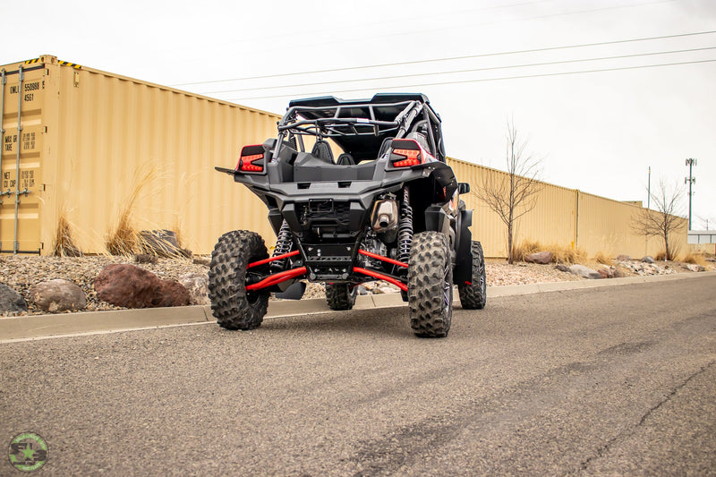Load image into Gallery viewer, 2023+ Kawasaki KRX 4 1000 FT. Rokblokz UTV Fender Kit, and mud flaps from the rear
