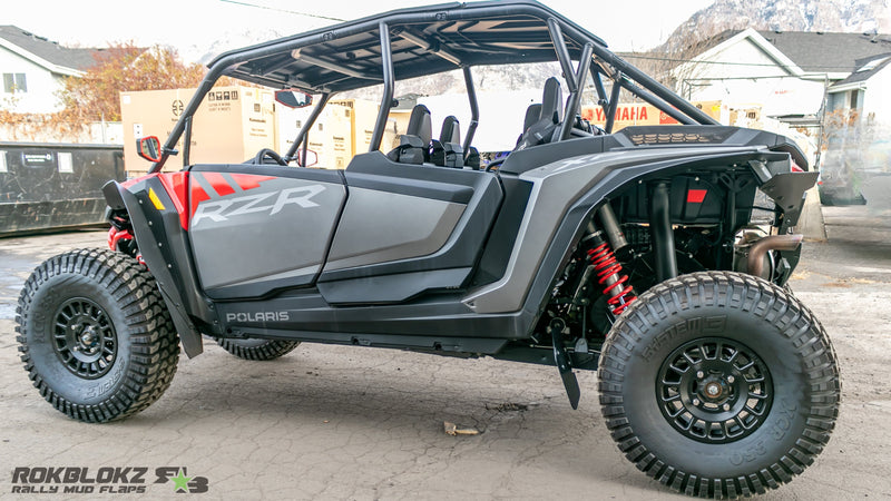 Load image into Gallery viewer, 2024 Polaris RZR XP Featuring Rokblokz Trailing Arm Mud Flaps in black (1)
