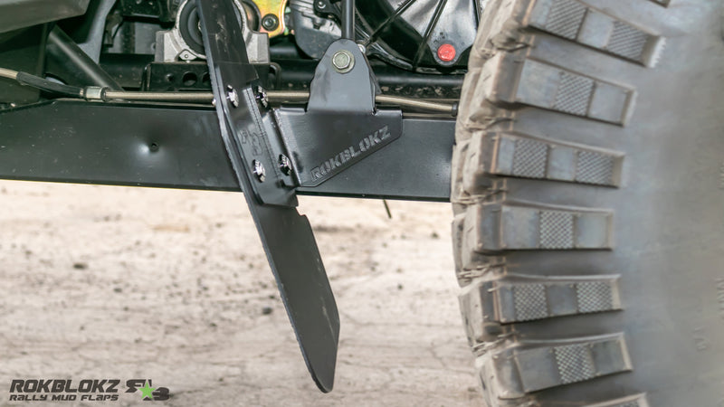Load image into Gallery viewer, 2024 Polaris RZR XP Featuring Rokblokz Trailing Arm Mud Flaps in black - bracket
