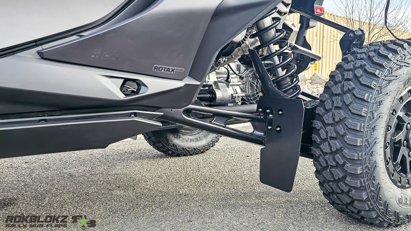 Load image into Gallery viewer, 2025 CanAm Maverick R Featuring Rokblokz Upgraded Trailing Arm Mud Flaps for OEM Bracket - wide view
