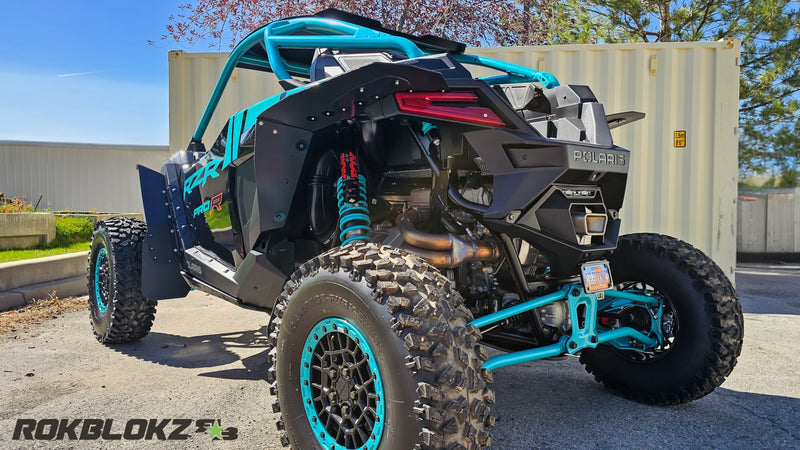 Load image into Gallery viewer, 2025 Polaris RZR Pro R Featuring Rokblokz Fender Kit in Black - driver rear corner
