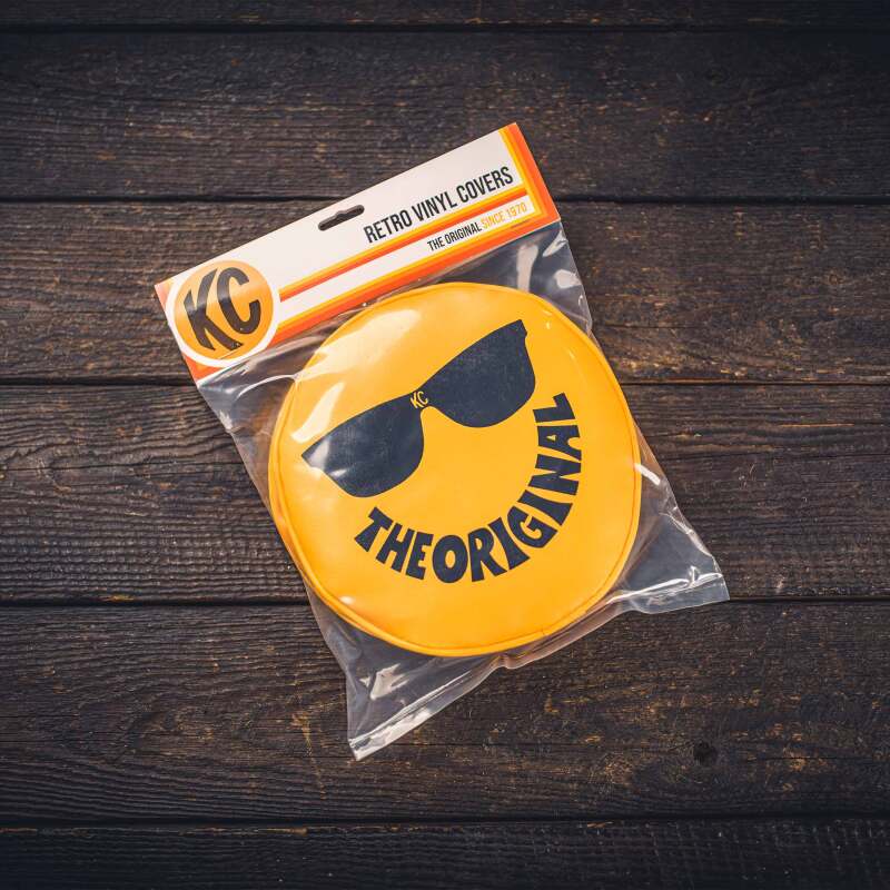 Load image into Gallery viewer, KC HiLiTES Retro 8in Round Yellow Vinyl Light Cover w/ Black KC The Original Logo (Pair)
