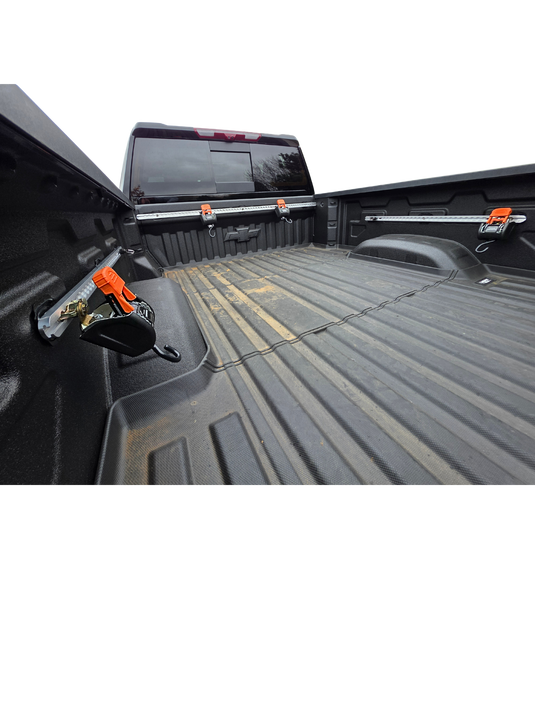 Truck bed tie down system
