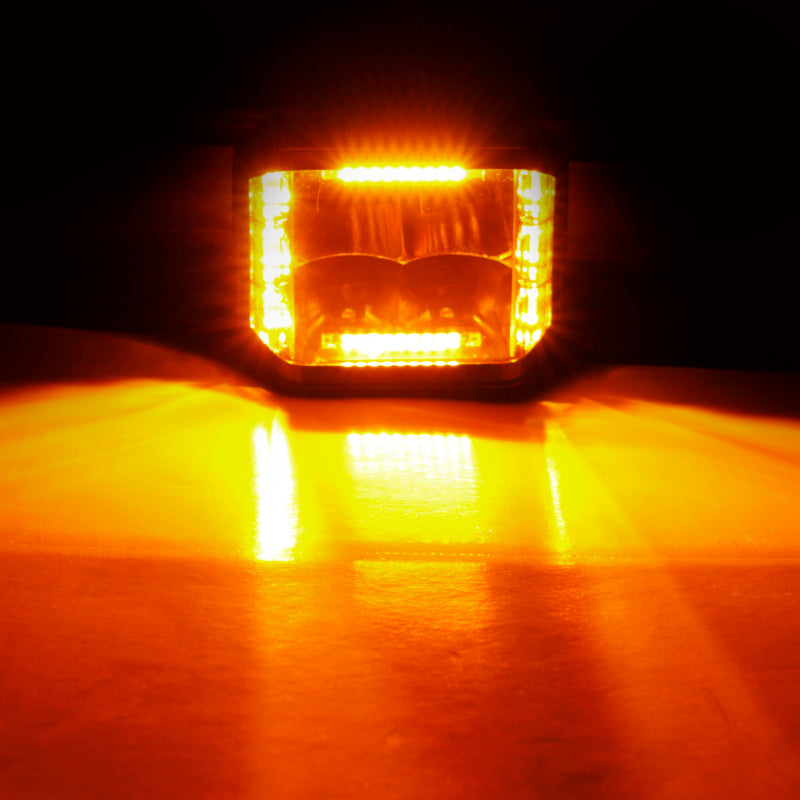 Load image into Gallery viewer, Go Rhino Xplor Blackout Combo Series Cube Sideline LED Spot Lights w/ Amber 4x3 - Blk (Pair)
