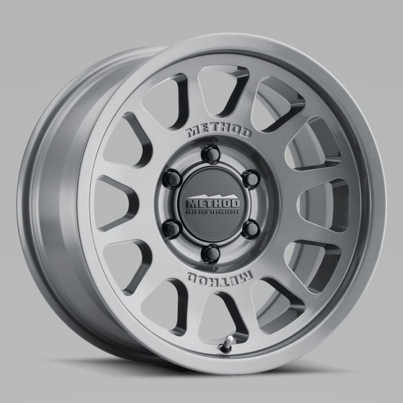 Load image into Gallery viewer, Method MR703 17x8.5 0mm Offset 6x5.5 106.25mm CB Gloss Titanium Wheel
