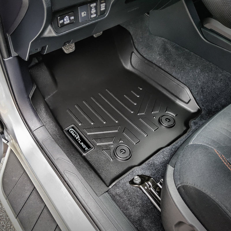 Load image into Gallery viewer, SmartCoverage™ Custom Fit Floor Liners For 2018-2023 Toyota Tacoma Double Cab (Manual Transmission)
