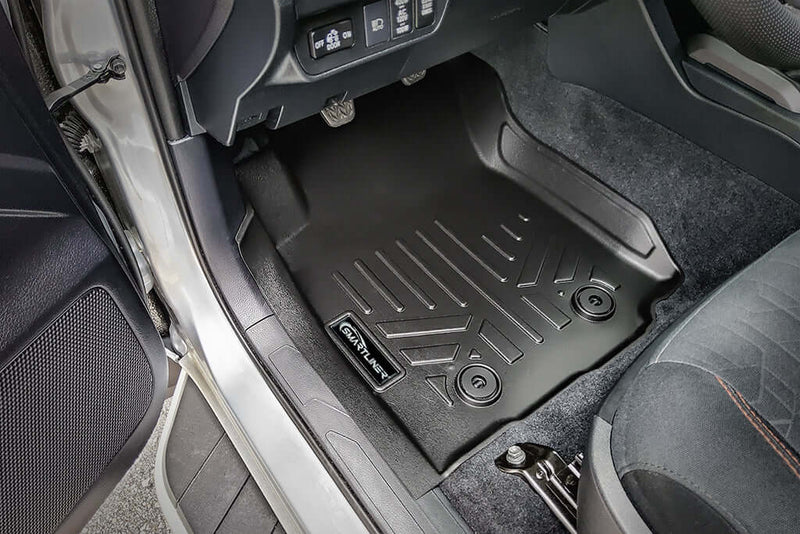 Load image into Gallery viewer, SmartCoverage™ Custom Fit Floor Liners For 2018-2023 Toyota Tacoma with Manual Transmission
