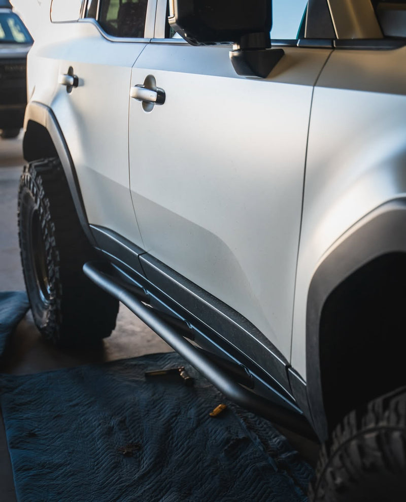 Load image into Gallery viewer, CAtuned Toyota Land Cruiser Rock Sliders
