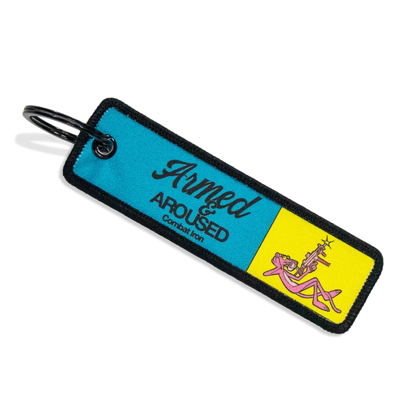 Load image into Gallery viewer, Armed &amp; Aroused Flight Tag Keychain

