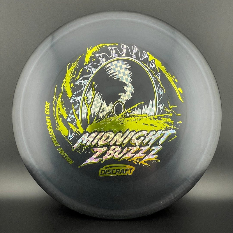 Load image into Gallery viewer, Midnight Z Buzzzsaw Buzzz - Limited 2 Foil Ledgestone 2023
