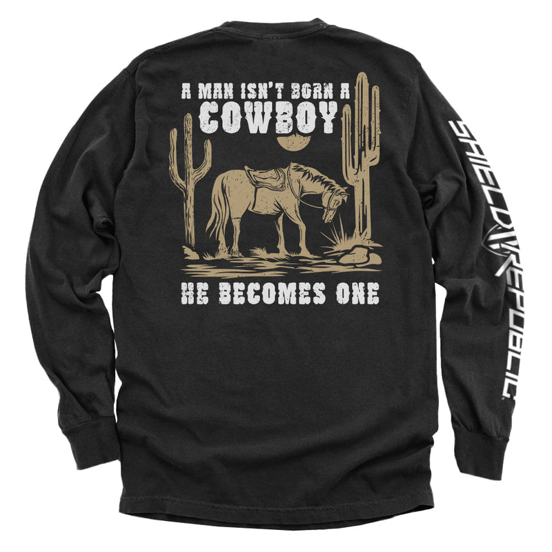 Load image into Gallery viewer, A Man Isn&#39;t Born A Cowboy
