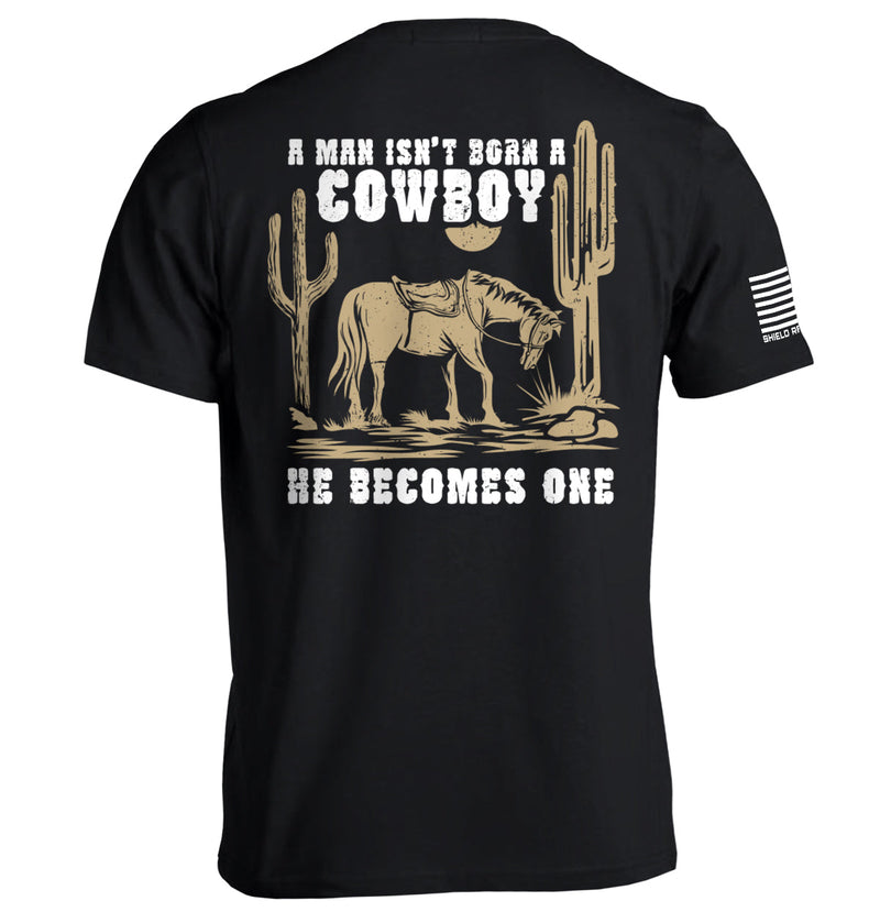 Load image into Gallery viewer, A Man Isn&#39;t Born A Cowboy
