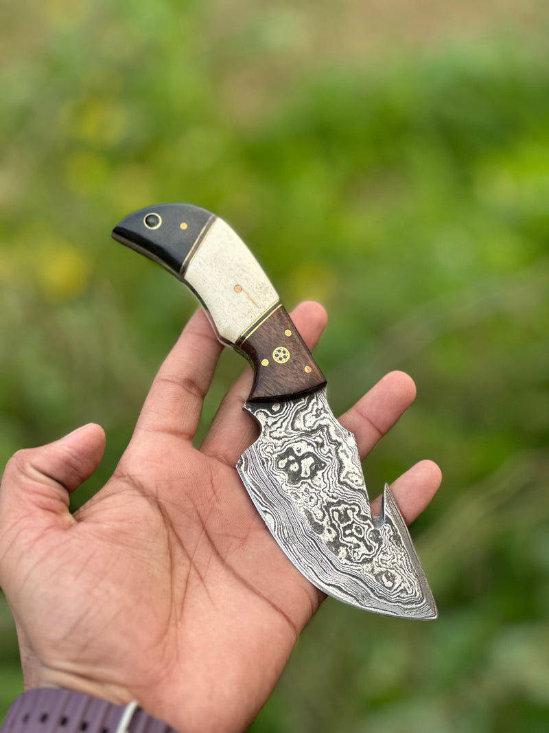 Load image into Gallery viewer, Custom Handmade Damascus Steel Guthook Skinning Knife with Rosewood, Camel Bone &amp; Black Sheet Handle - 7.5” with Leather Sheath
