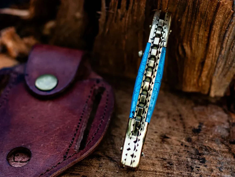 Load image into Gallery viewer, Custom Handmade Fish Style Damascus Steel Folding Knife with Epoxy Resin Handle &amp; Brass Accents - Includes Leather Sheath
