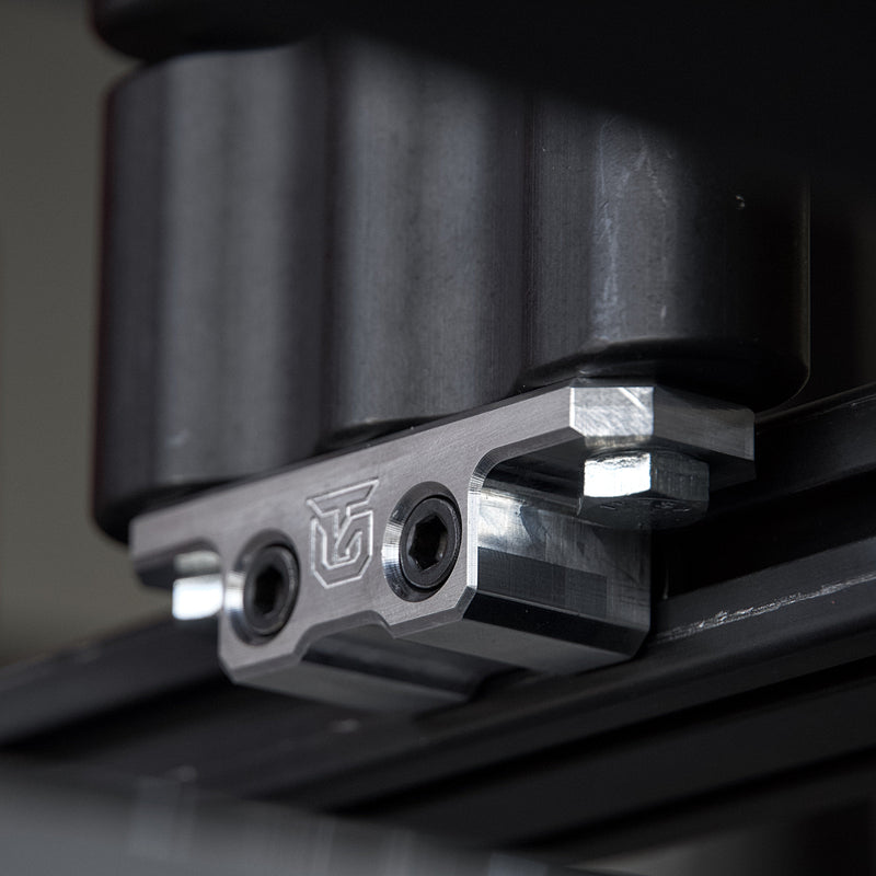 Load image into Gallery viewer, Billet aluminum Rotopax mount adapter for extrusion roof rack cross bars.
