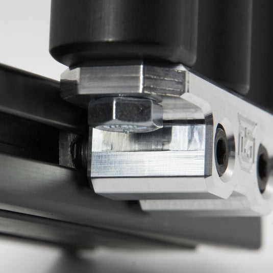 Billet aluminum Rotopax mount adapter for extrusion roof rack cross bars.