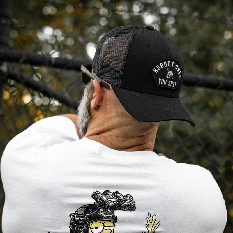 Load image into Gallery viewer, Nobody Owes You Shit Arched Skull Patch Snapback
