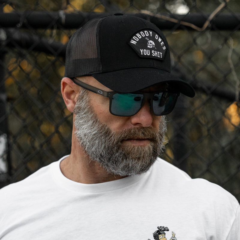 Load image into Gallery viewer, Nobody Owes You Shit Arched Skull Patch Snapback
