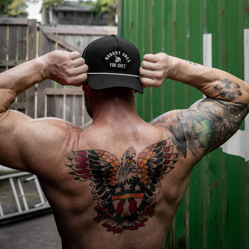 Load image into Gallery viewer, Nobody Owes You Shit Skull Arched Patch Rope Snapback

