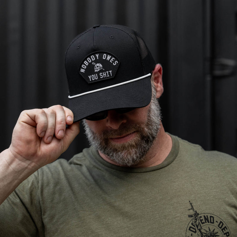 Load image into Gallery viewer, Nobody Owes You Shit Skull Arched Patch Rope Snapback
